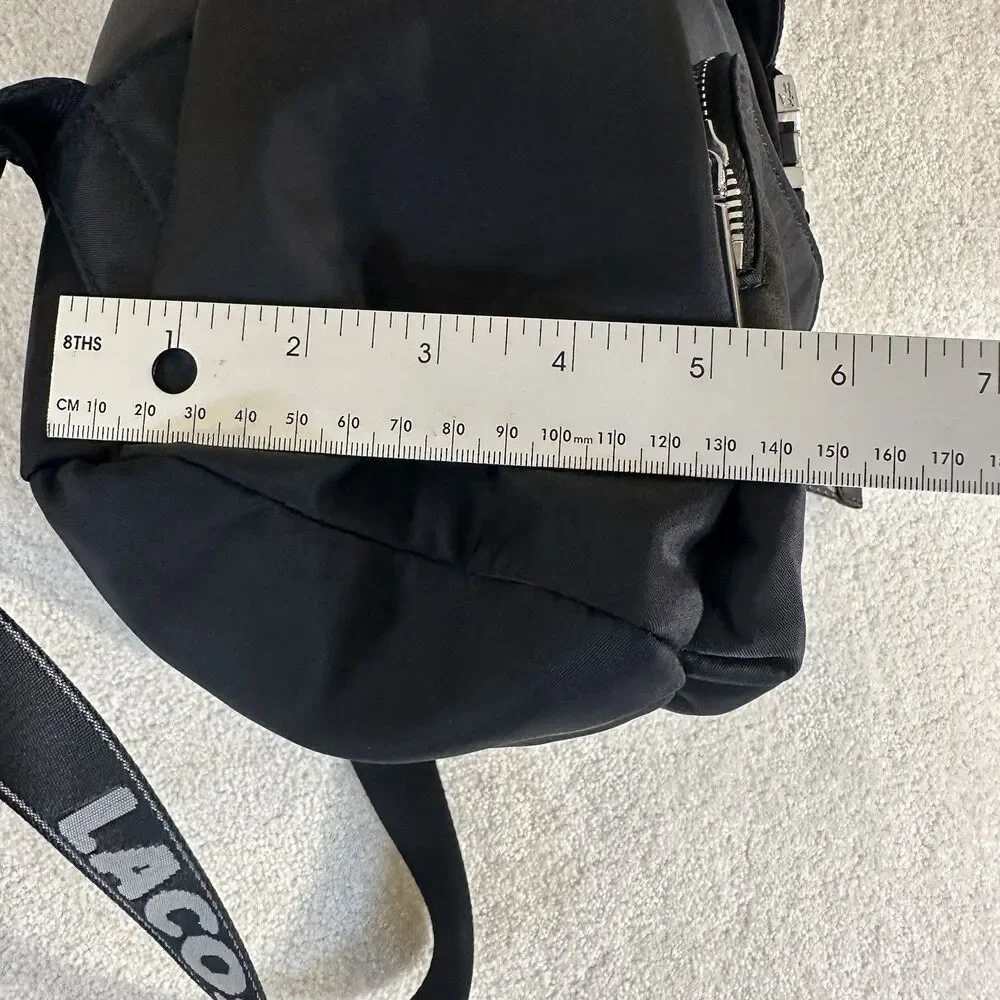 Lacoste Women's Solid Black Cinch Flap Nylon Bag Backpack